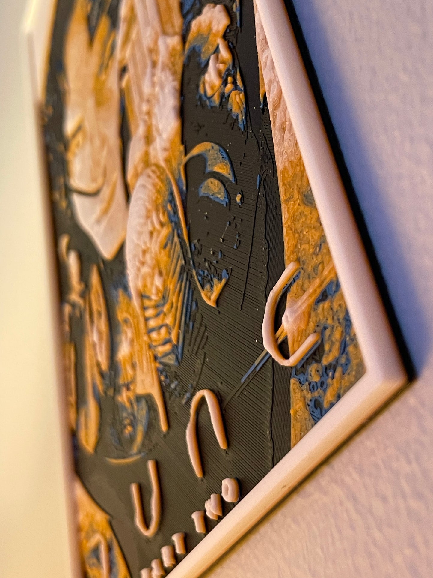 Decorative wall art with intricate designs on a textured surface