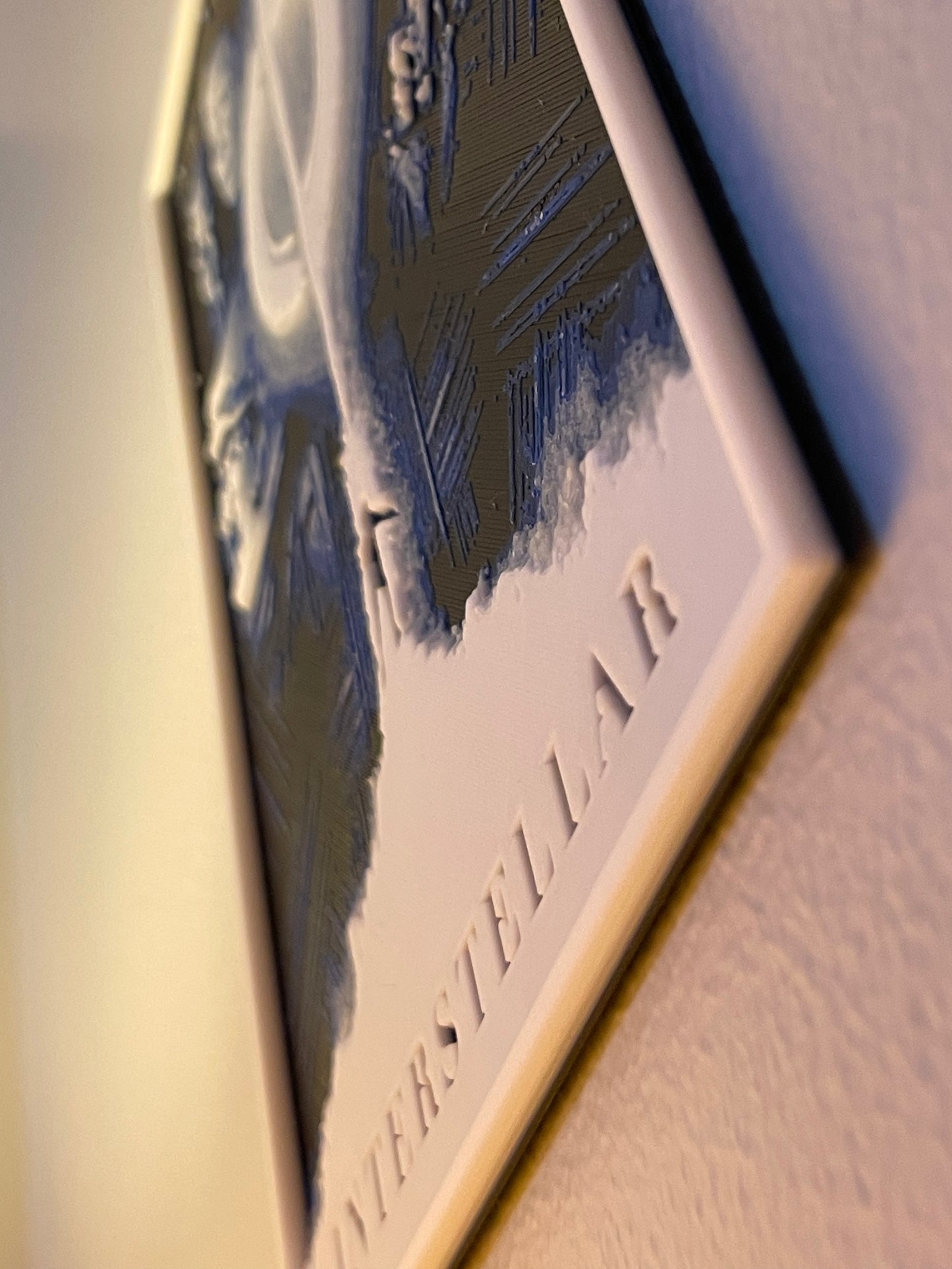 Close-up of a product with 'interstellar' in a circle logo and text on a light background