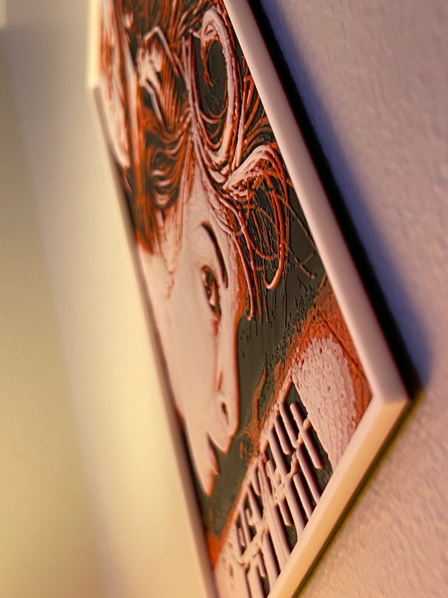 Close-up of a decorative item with intricate patterns on a textured surface