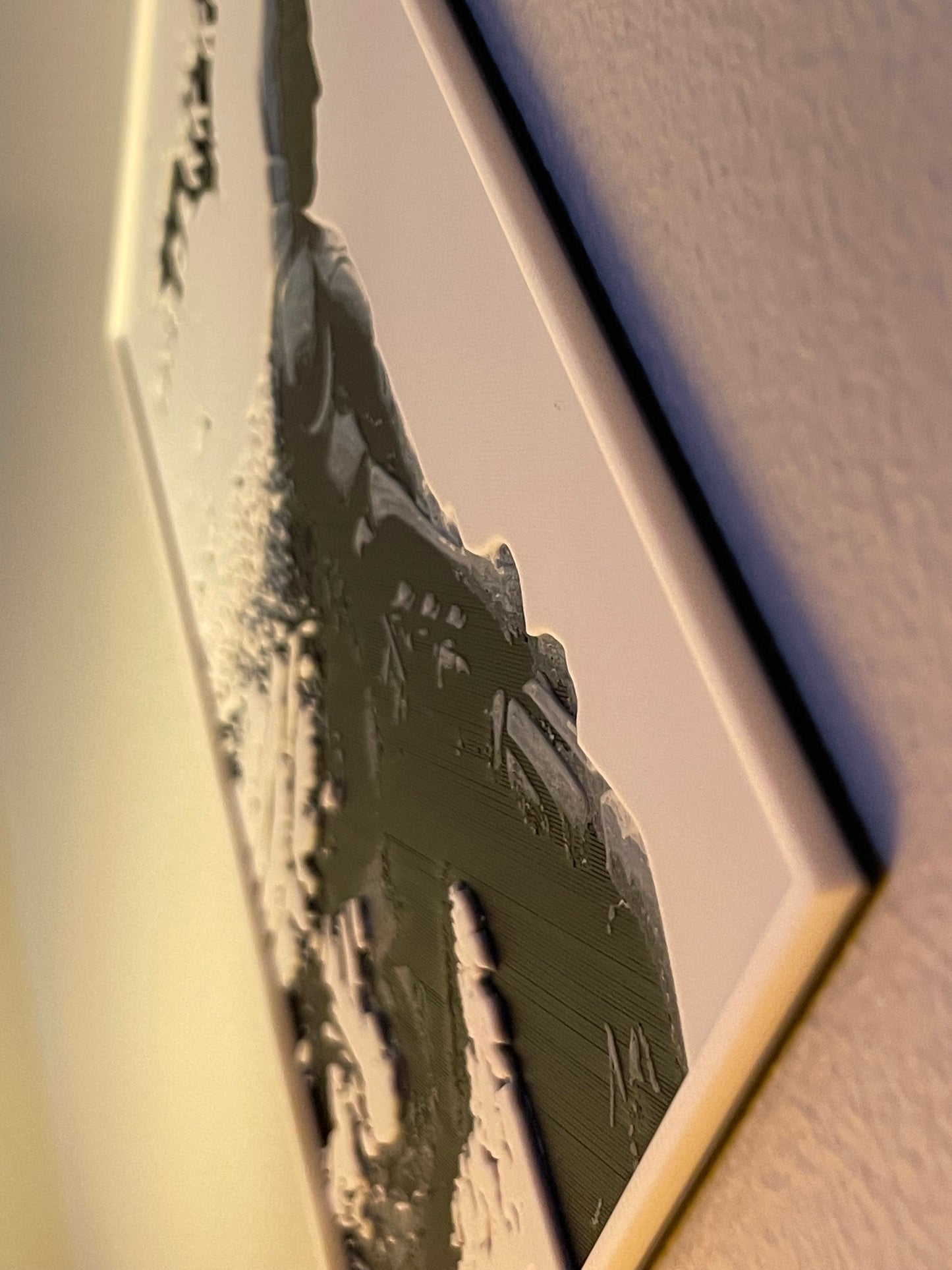 Close-up of batman with a focus on texture and color.