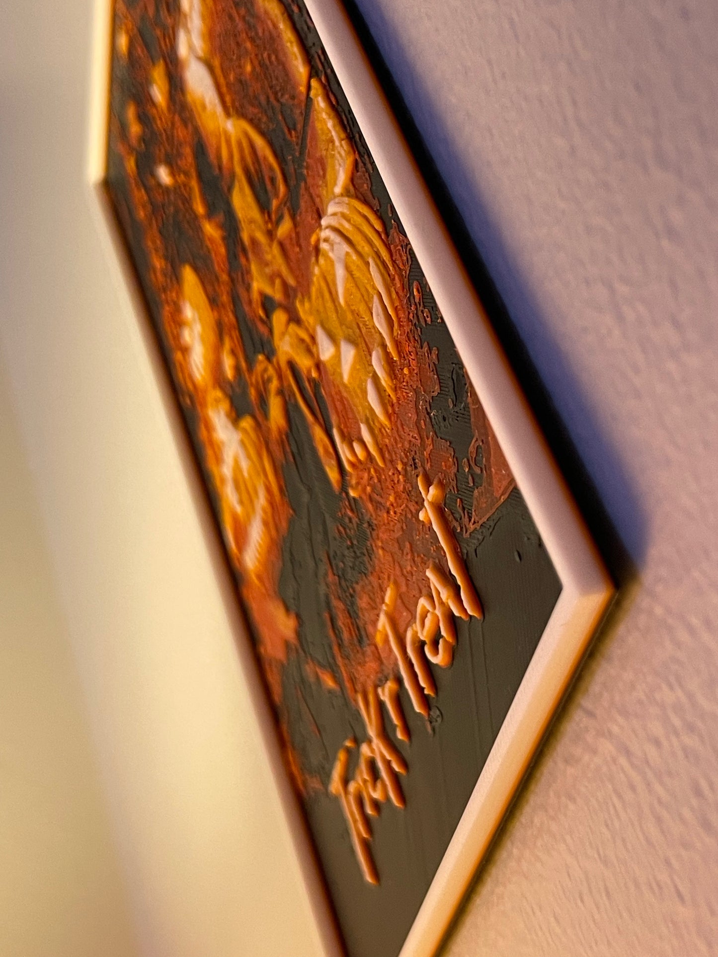 Decorative plaque with embossed design and text on a plain background