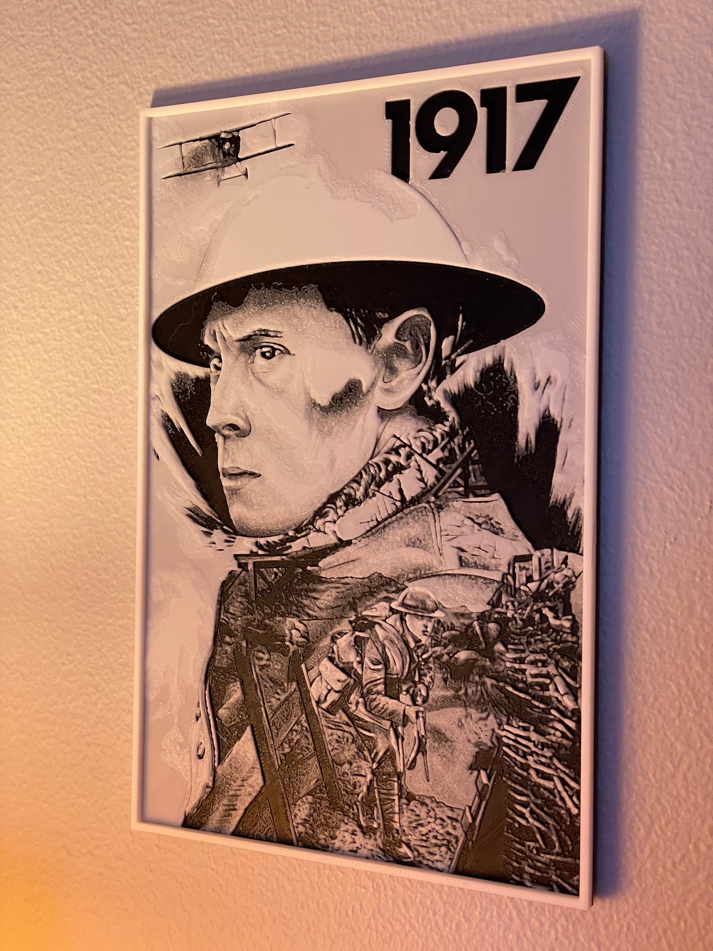 Poster of a person in military uniform with '1917' text on a textured wall.