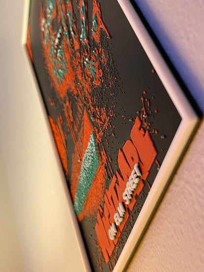 Close-up of a textured surface with red and green patterns and 'freddy' branding.