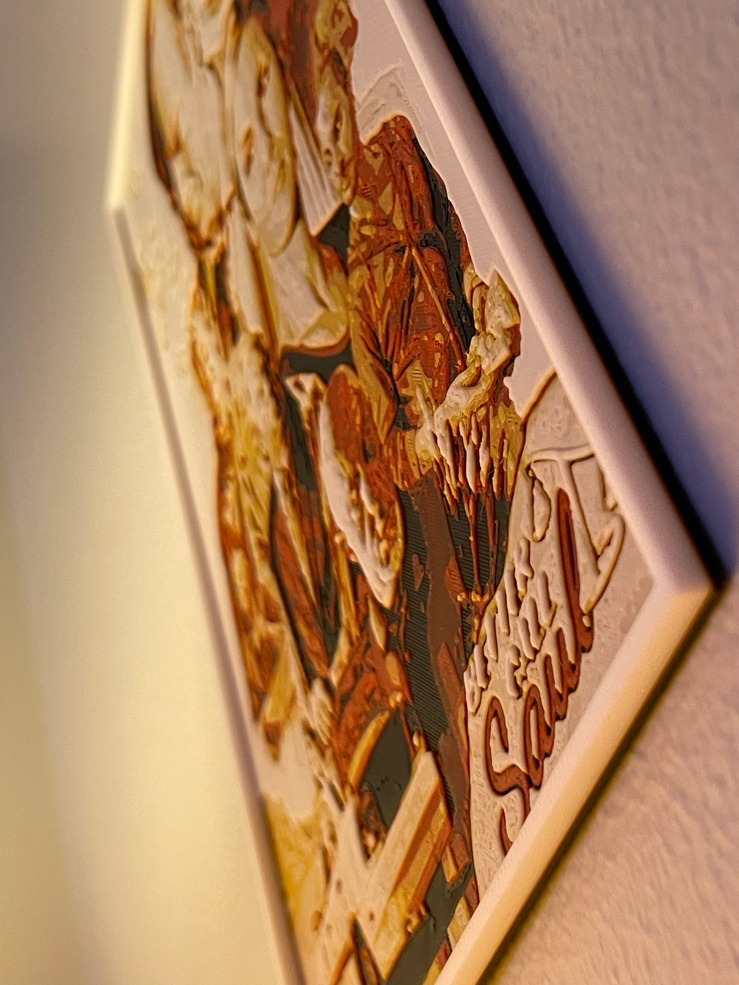 Decorative wall art with a collage of images and 'better call saul' text on a plain background