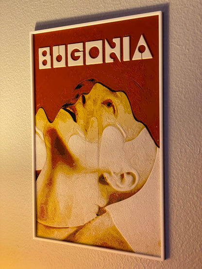 Decorative wall art with a stylized face and 'BUGONIA' text on a brown background.