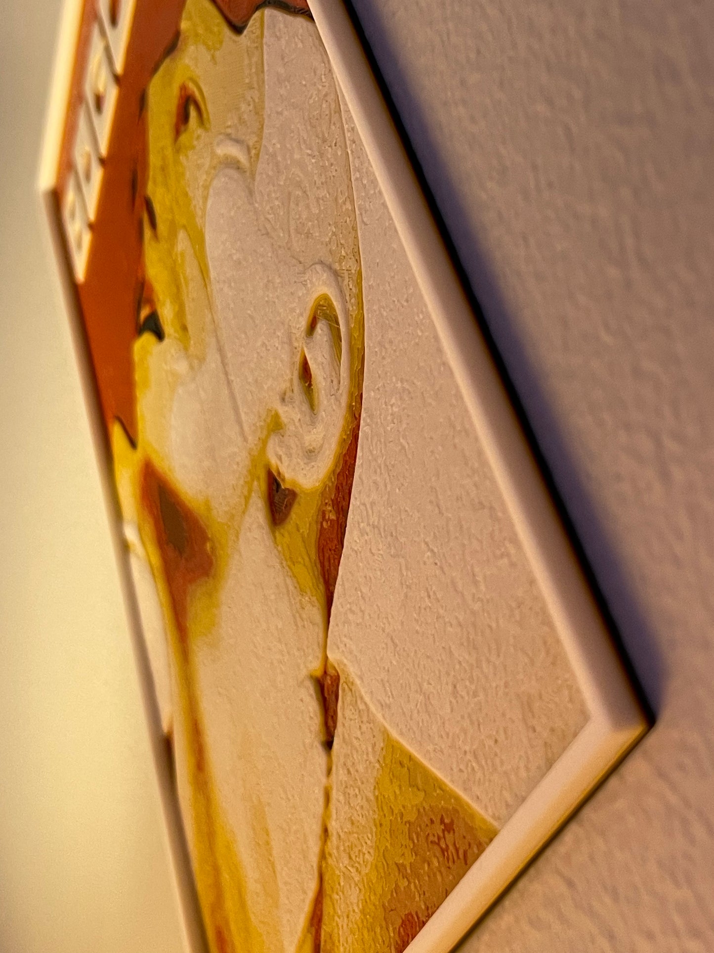 Close-up of a decorative wall piece with geometric patterns