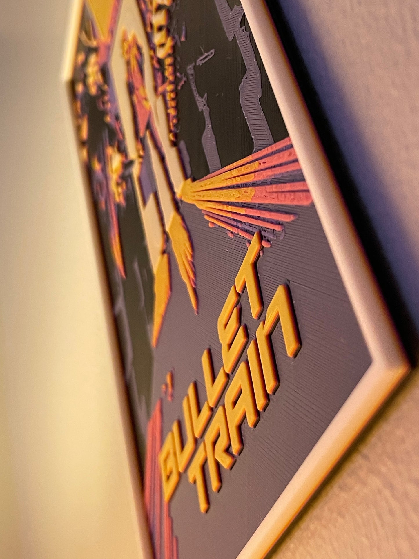 Close-up of a 'Bullet Train' logo on a metallic surface