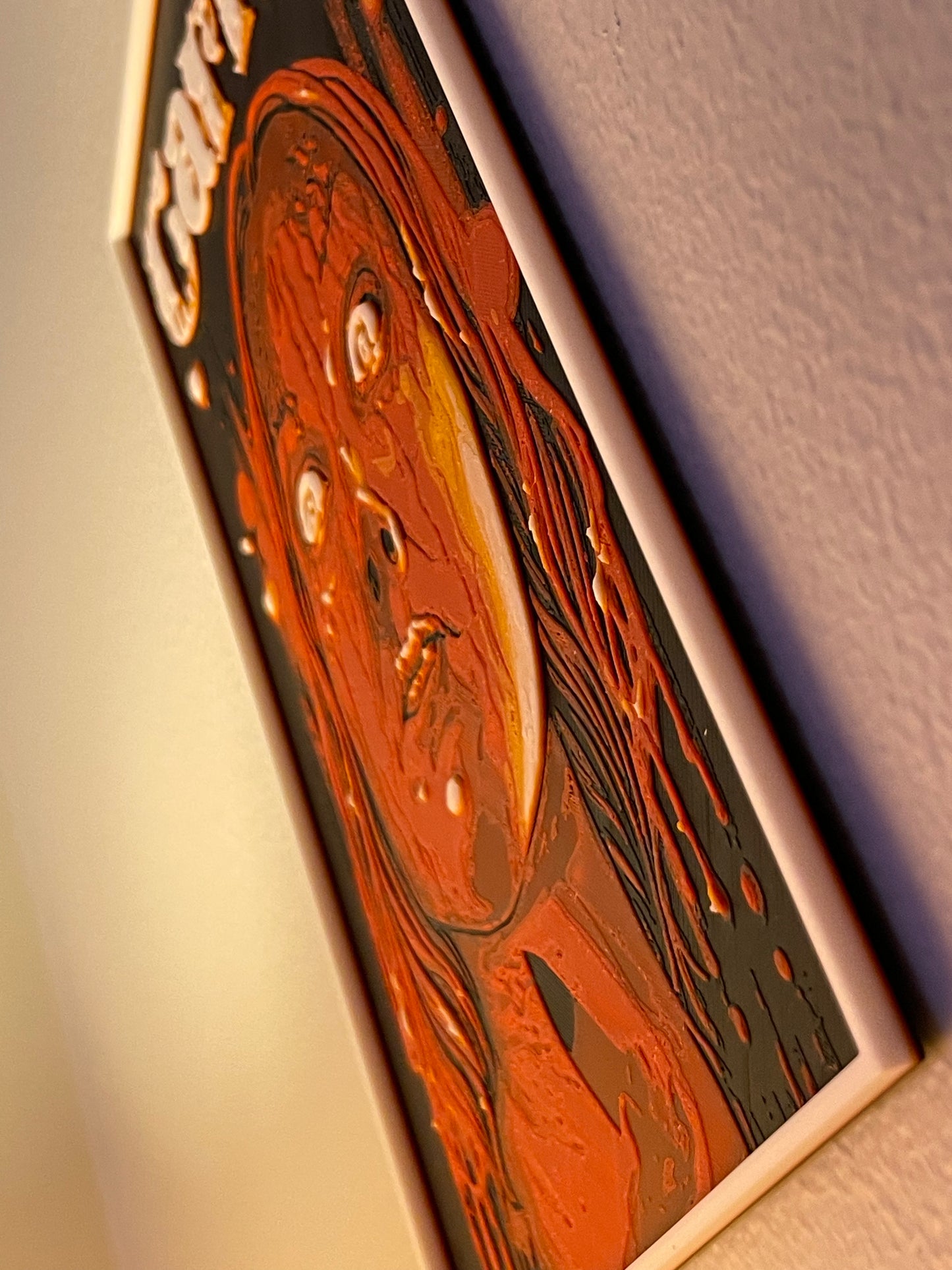 Close-up of a wooden product with intricate carvings on a neutral background