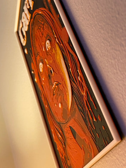 Close-up of a wooden product with intricate carvings on a neutral background