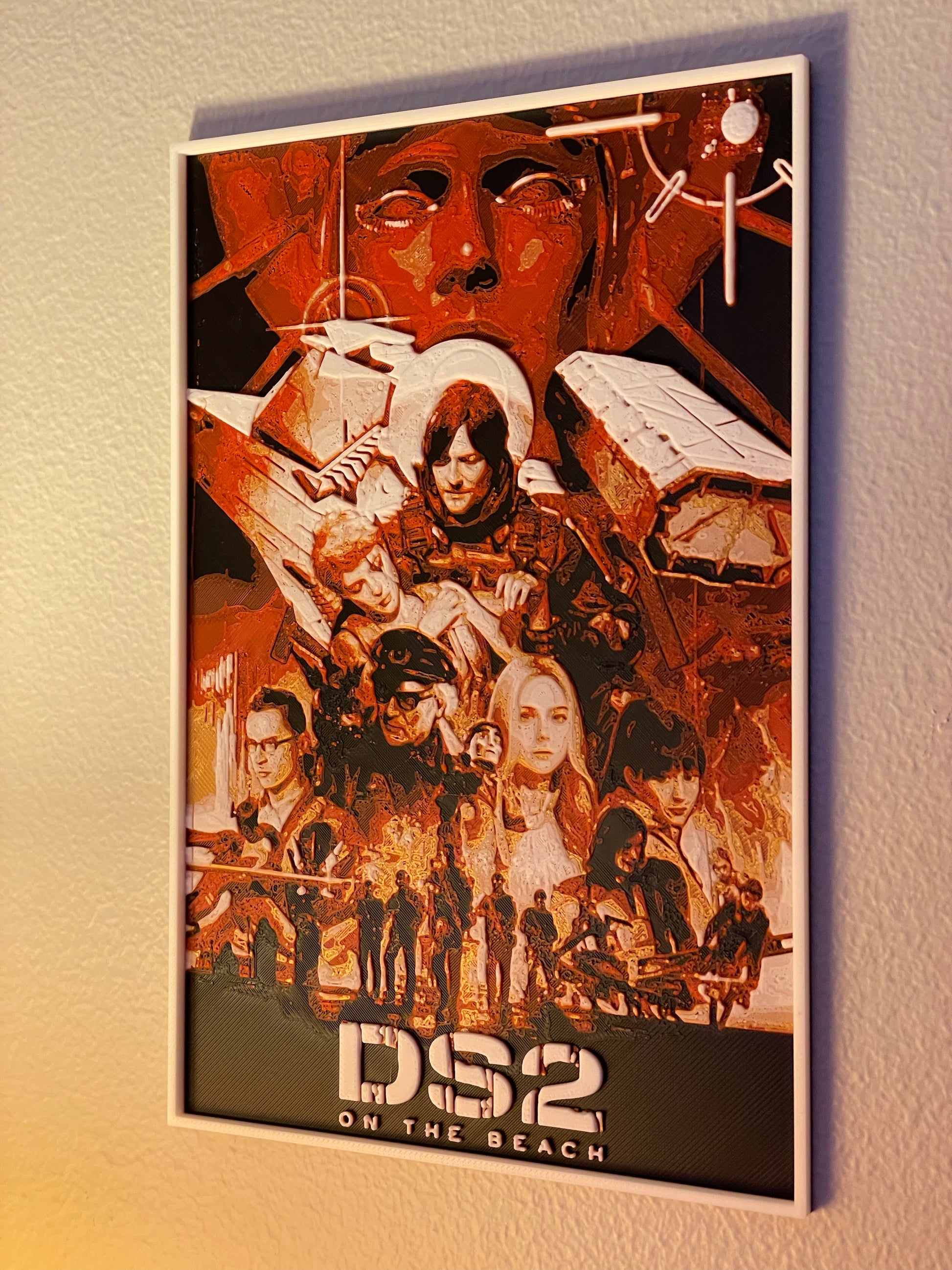 Poster of 'DS2 On The Beach' with characters and text on a beige wall.
