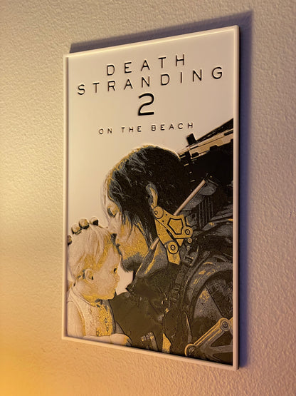 Poster for 'Death Stranding 2: On the Beach' with a character holding a baby against a beige wall.