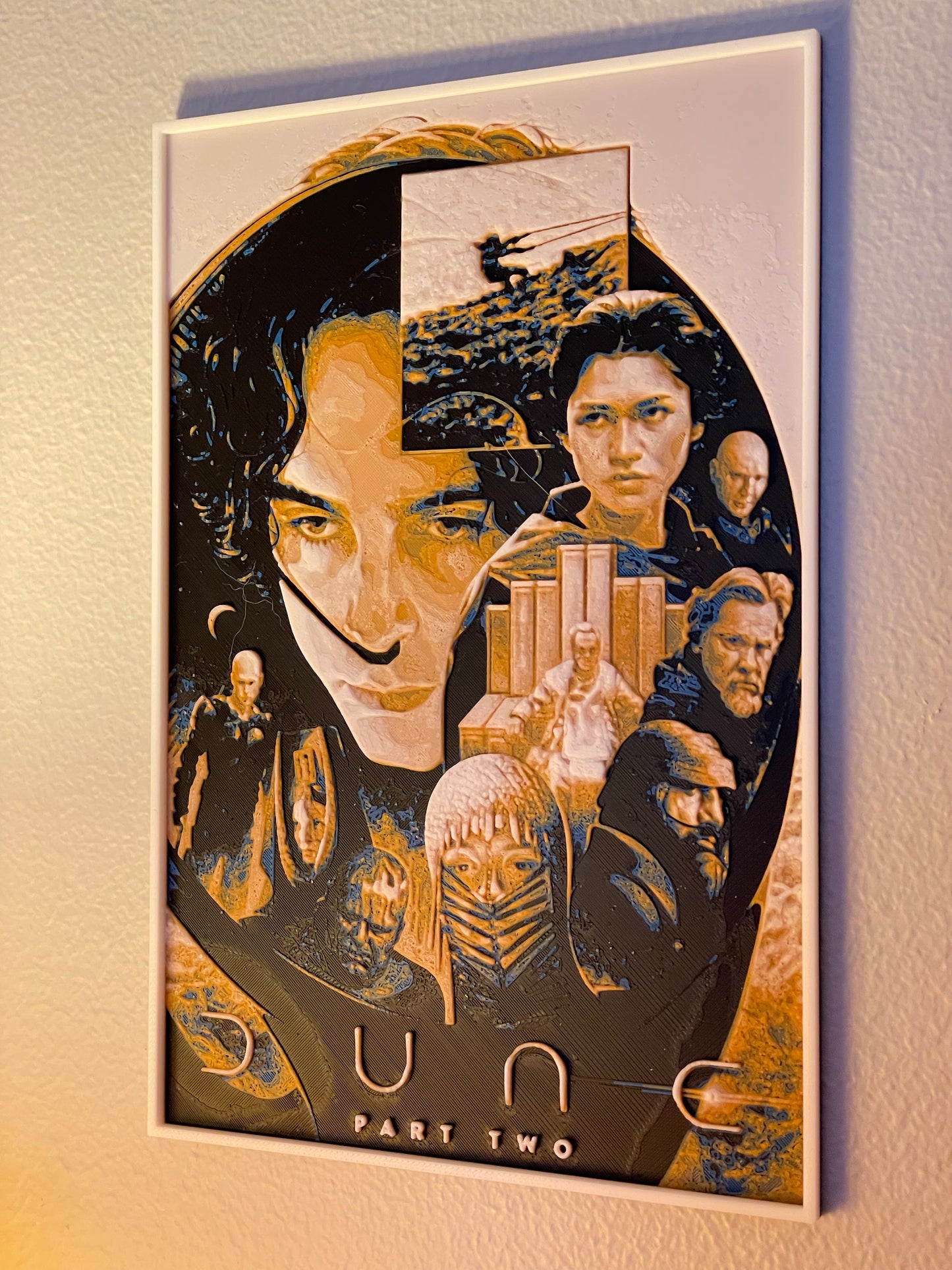 Movie poster for 'Dune Part Two' with a stylized portrait and character images on a beige background