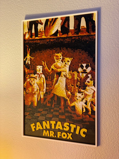 Poster of 'Fantastic Mr. Fox' with animated fox characters on a wall.