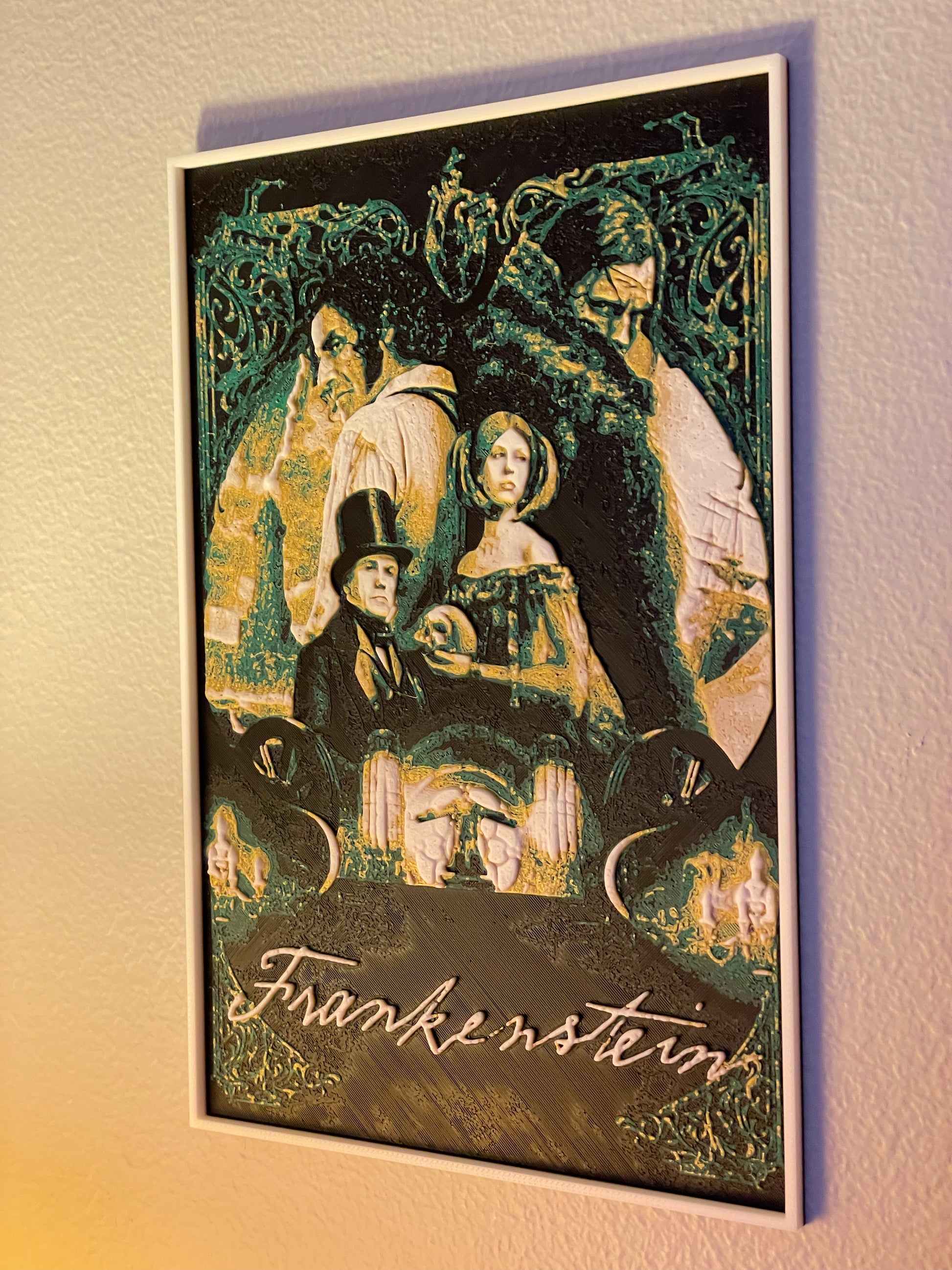 Decorative poster of 'Frankenstein' with characters and text on a wall.