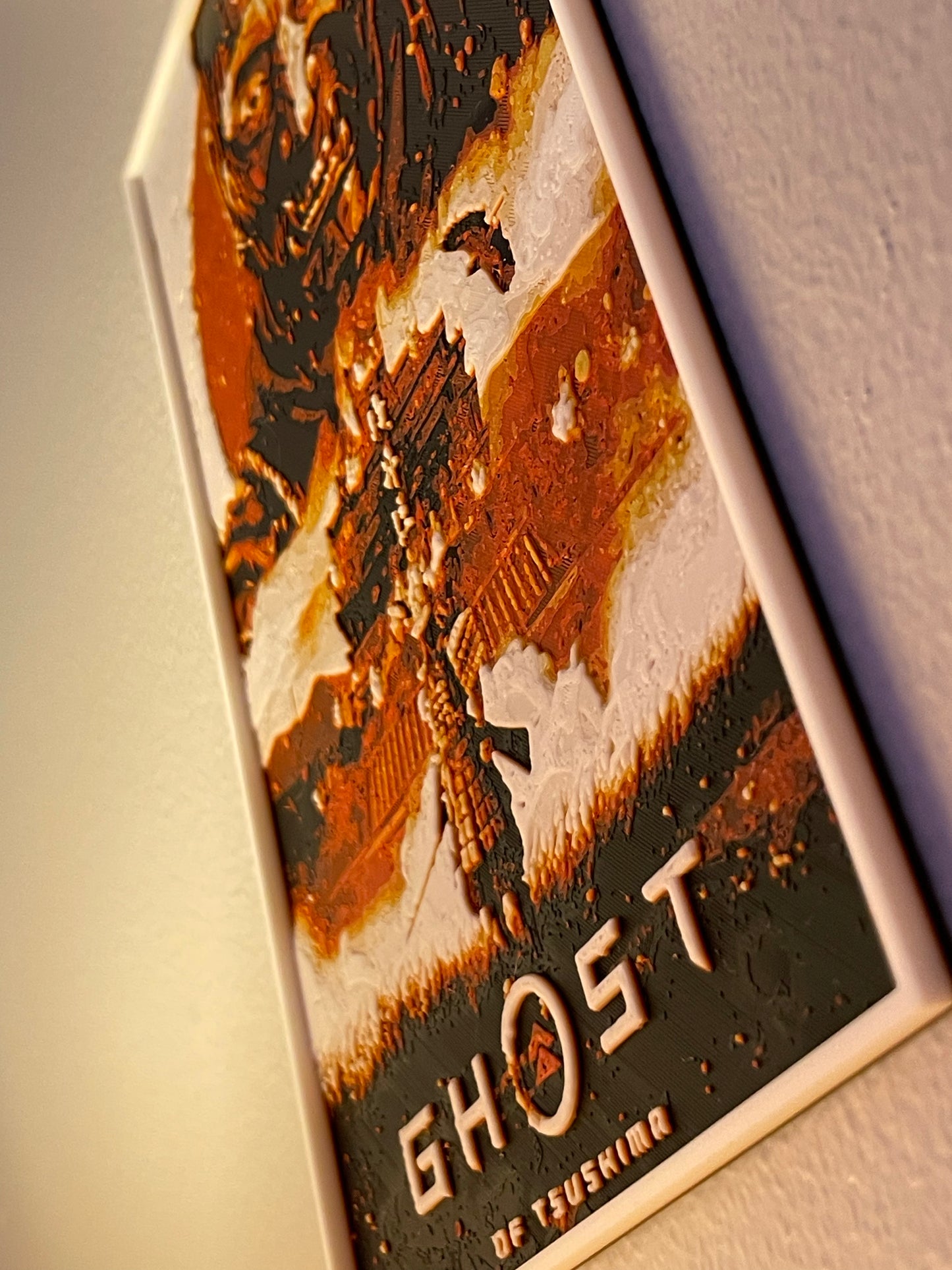 Close-up of a product packaging with 'Ghost' branding and intricate design.