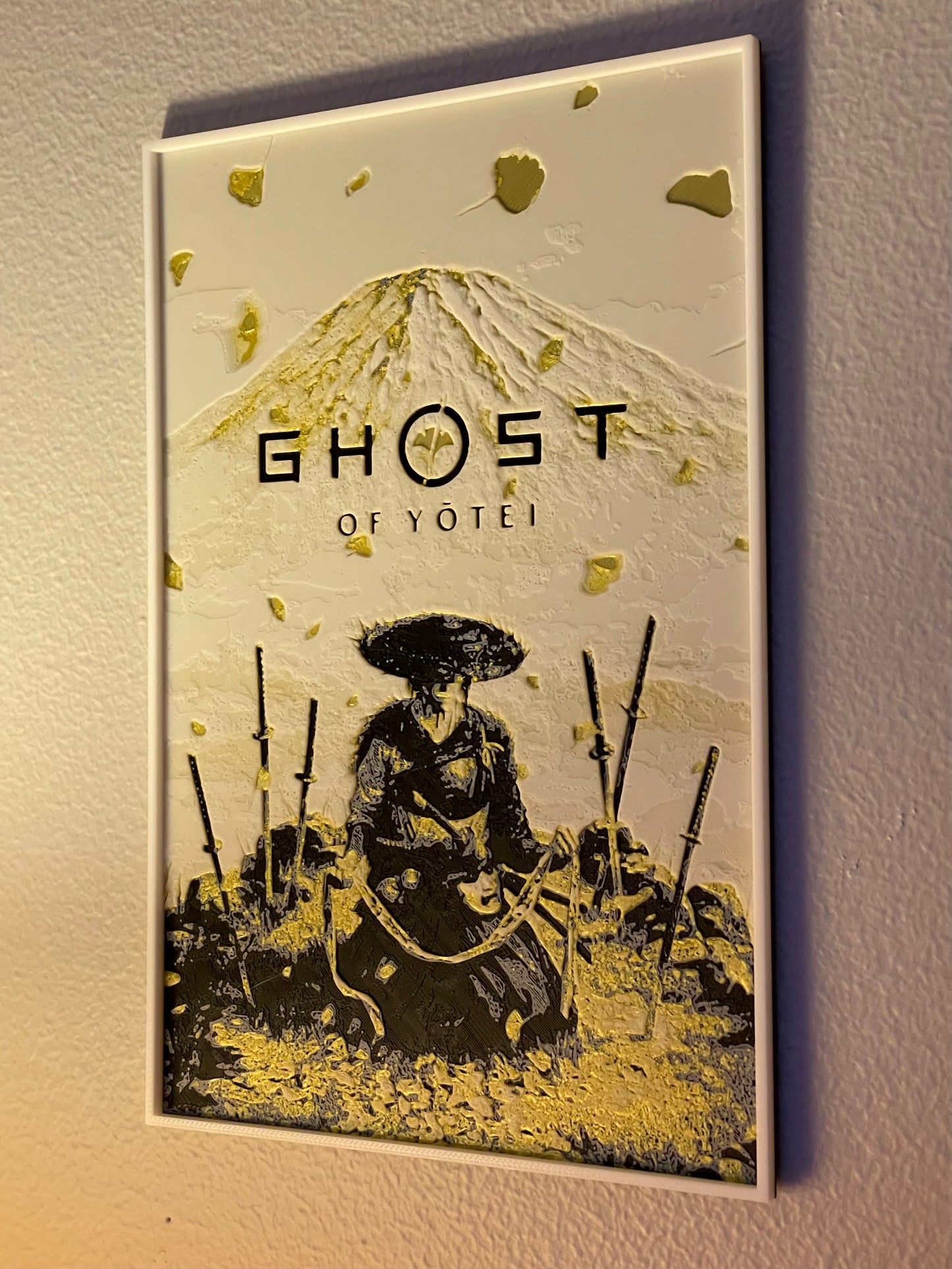 Product poster for 'Ghost of Yotei' with a mountain and samurai design on a beige background.
