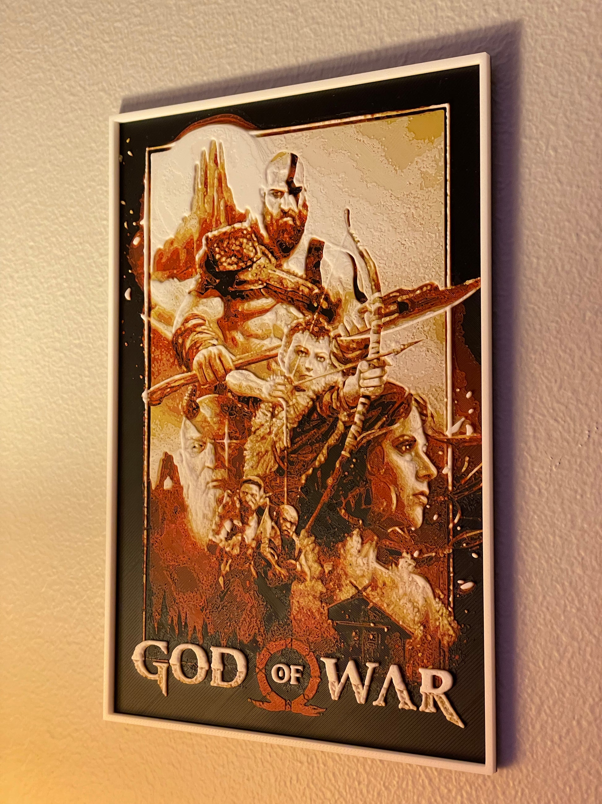Framed 'God of War' movie poster on a wall