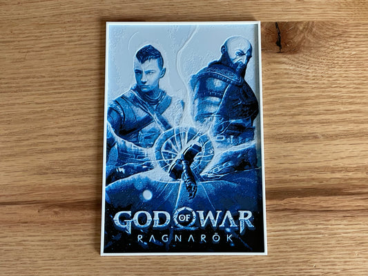 God of War Ragnarök game case on a wooden surface