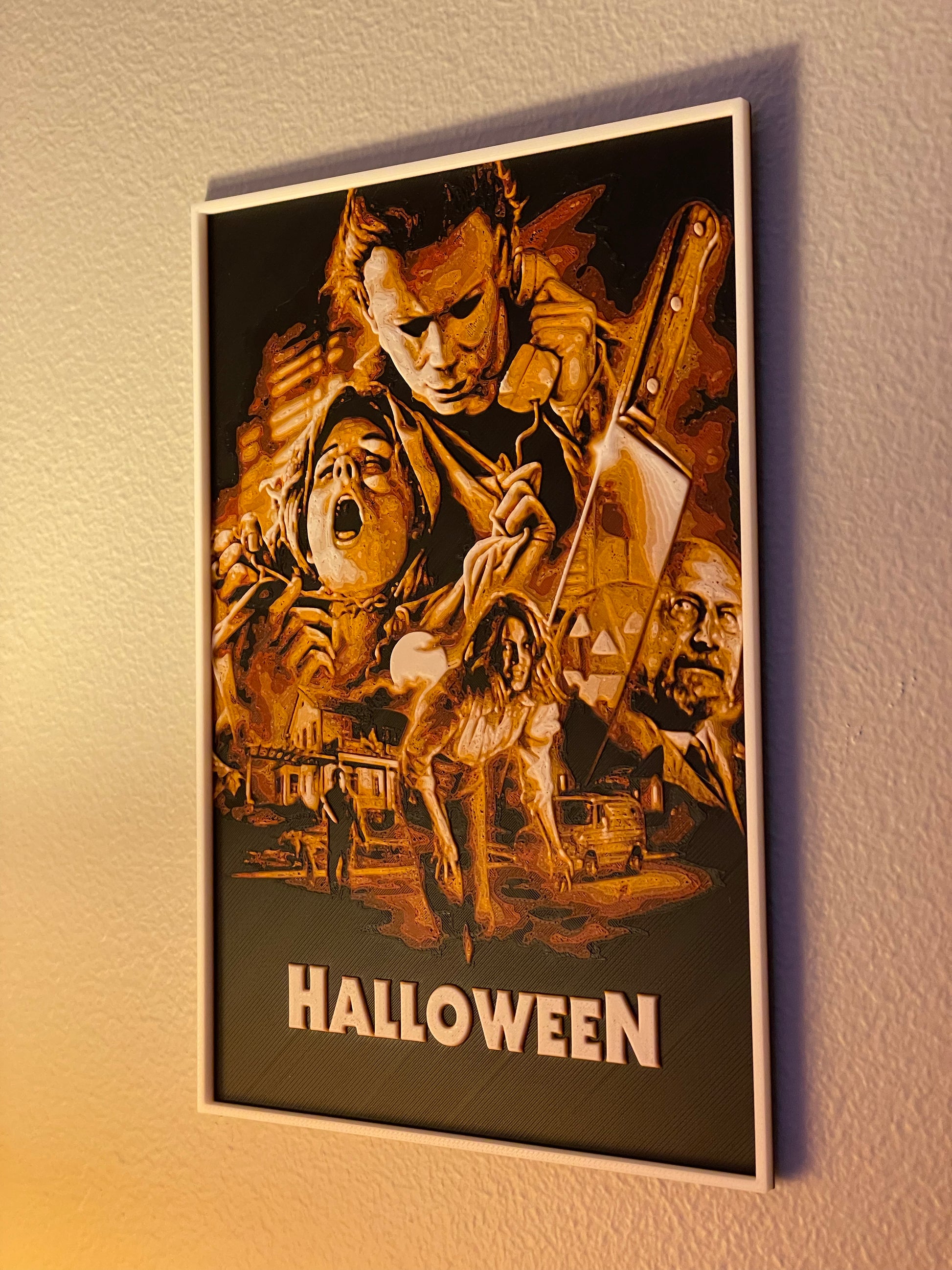 Framed 'Halloween' movie poster on a wall