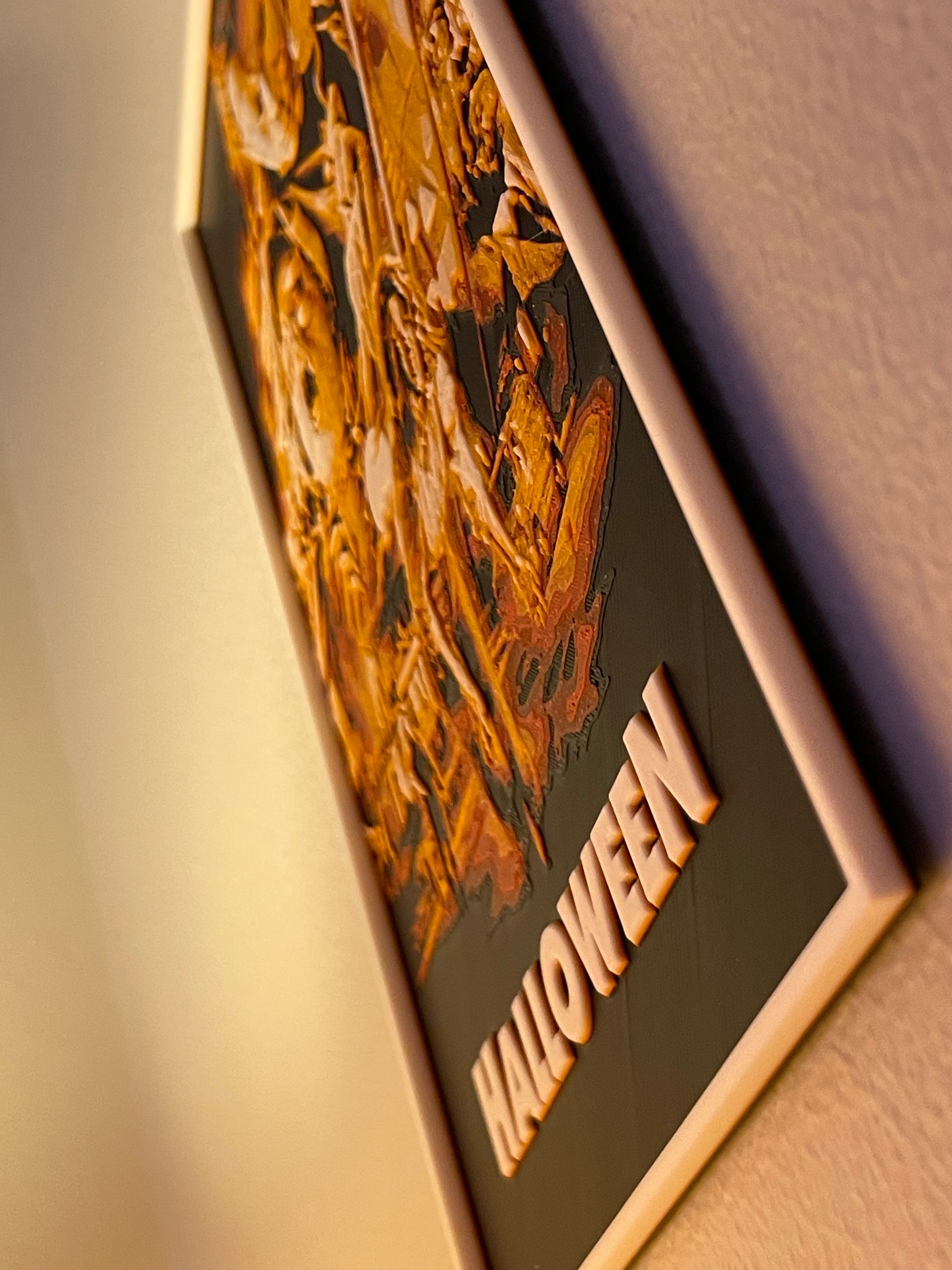 Halloween-themed product packaging with decorative design and 'HALLOWEEN' text.