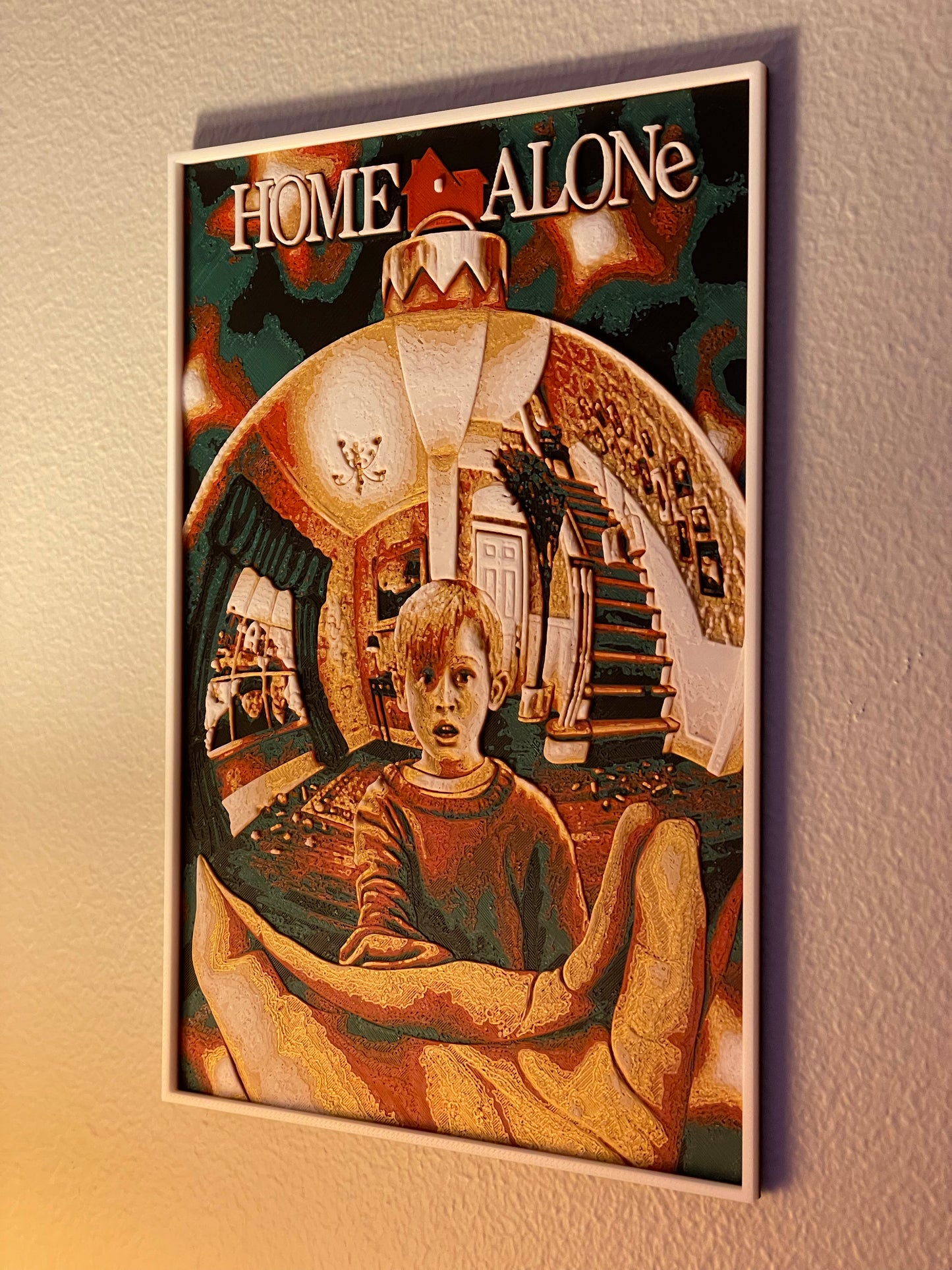 Poster of a scene from 'Home Alone' on a wall.