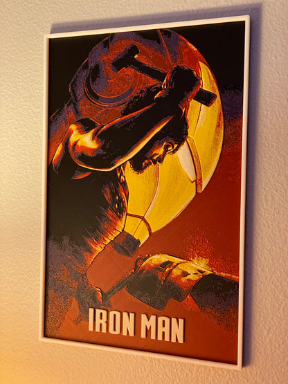 Framed poster of Iron Man holding a hammer on a dark background