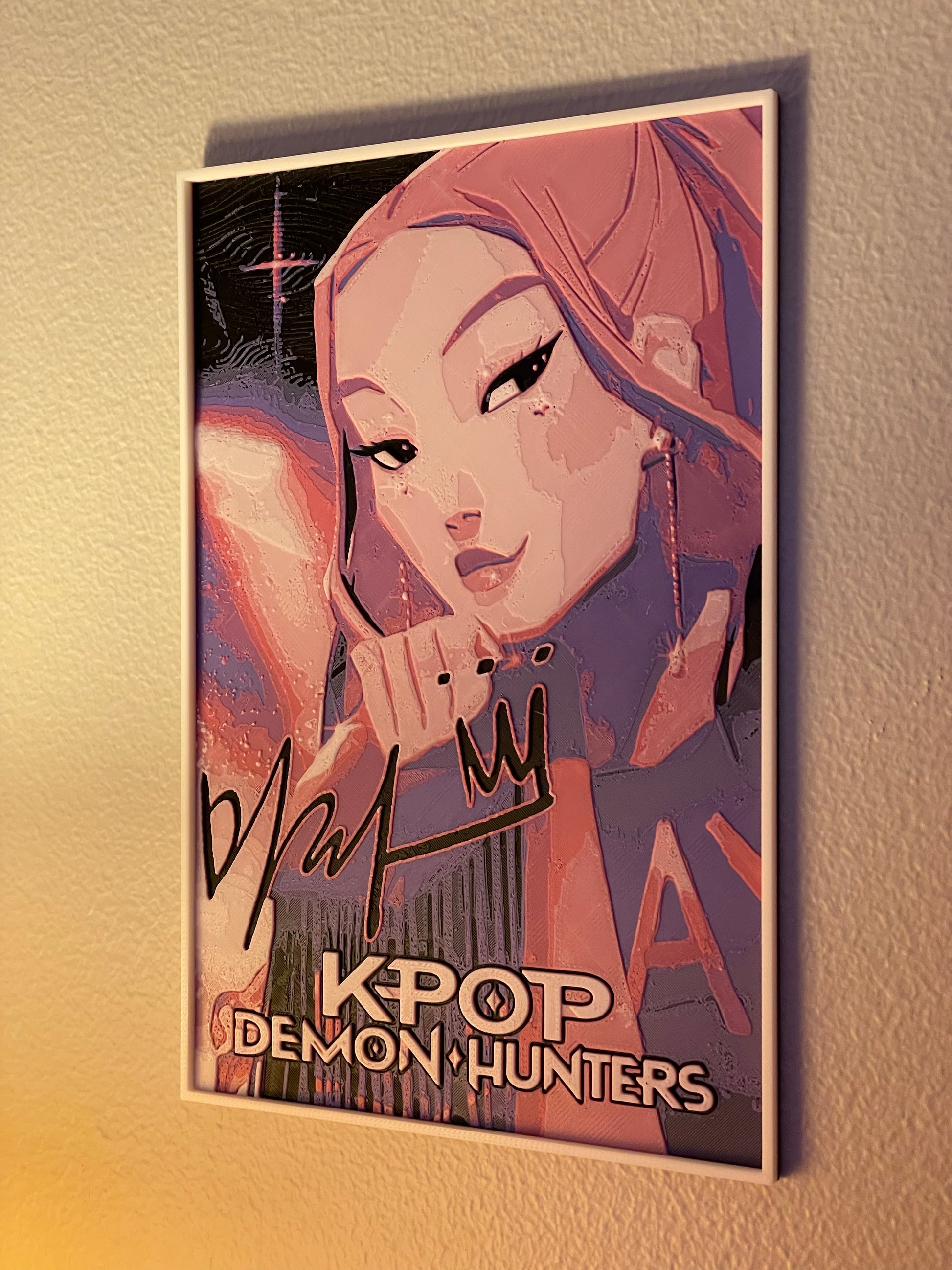 Poster of a KPOP artist with stylized text on a textured wall.