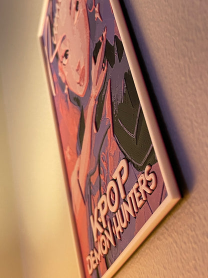 Decorative plaque with 'KPOP Demon Hunters' text on a plain background