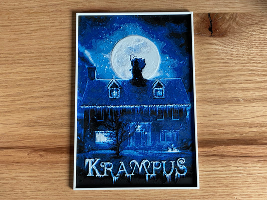 Poster of Krampus with a house and moon on a wooden surface