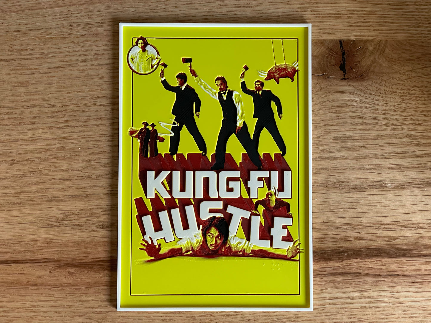 Poster of 'Kung Fu Hustle' on a wooden surface