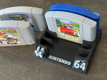 Nintendo 64 game cartridge on a display stand with another cartridge in the background.