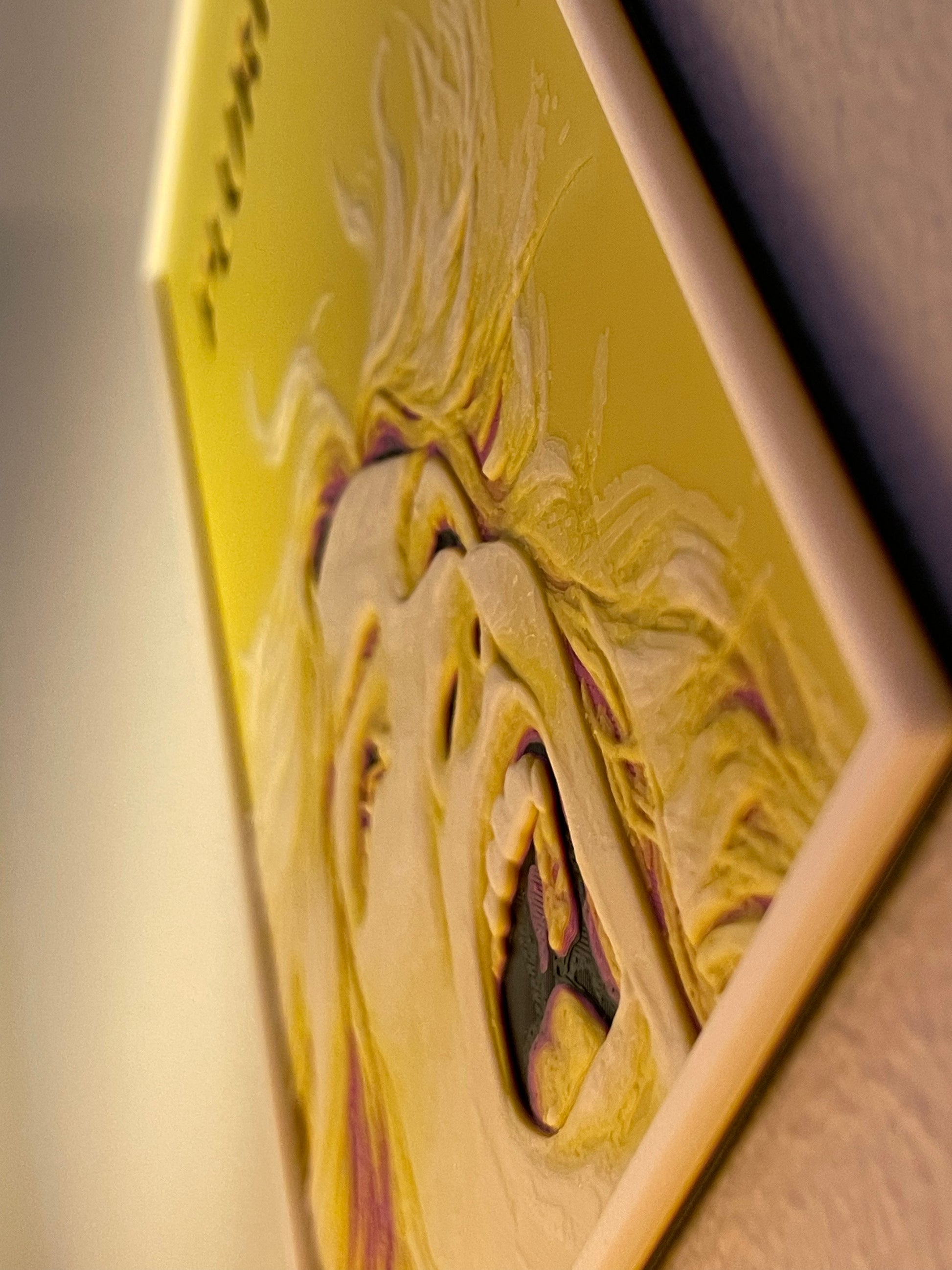 Close-up of a yellow light switch with artistic design