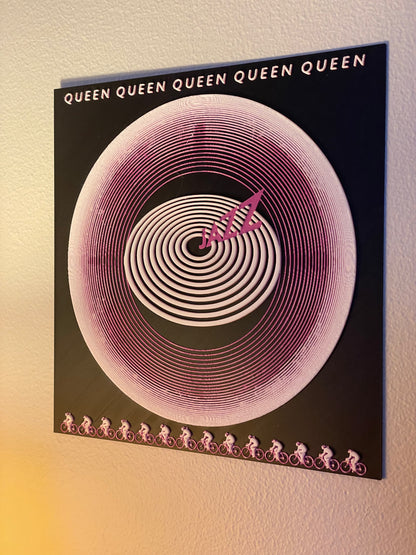 Album cover with spiral design and 'Queen' branding on a gradient background