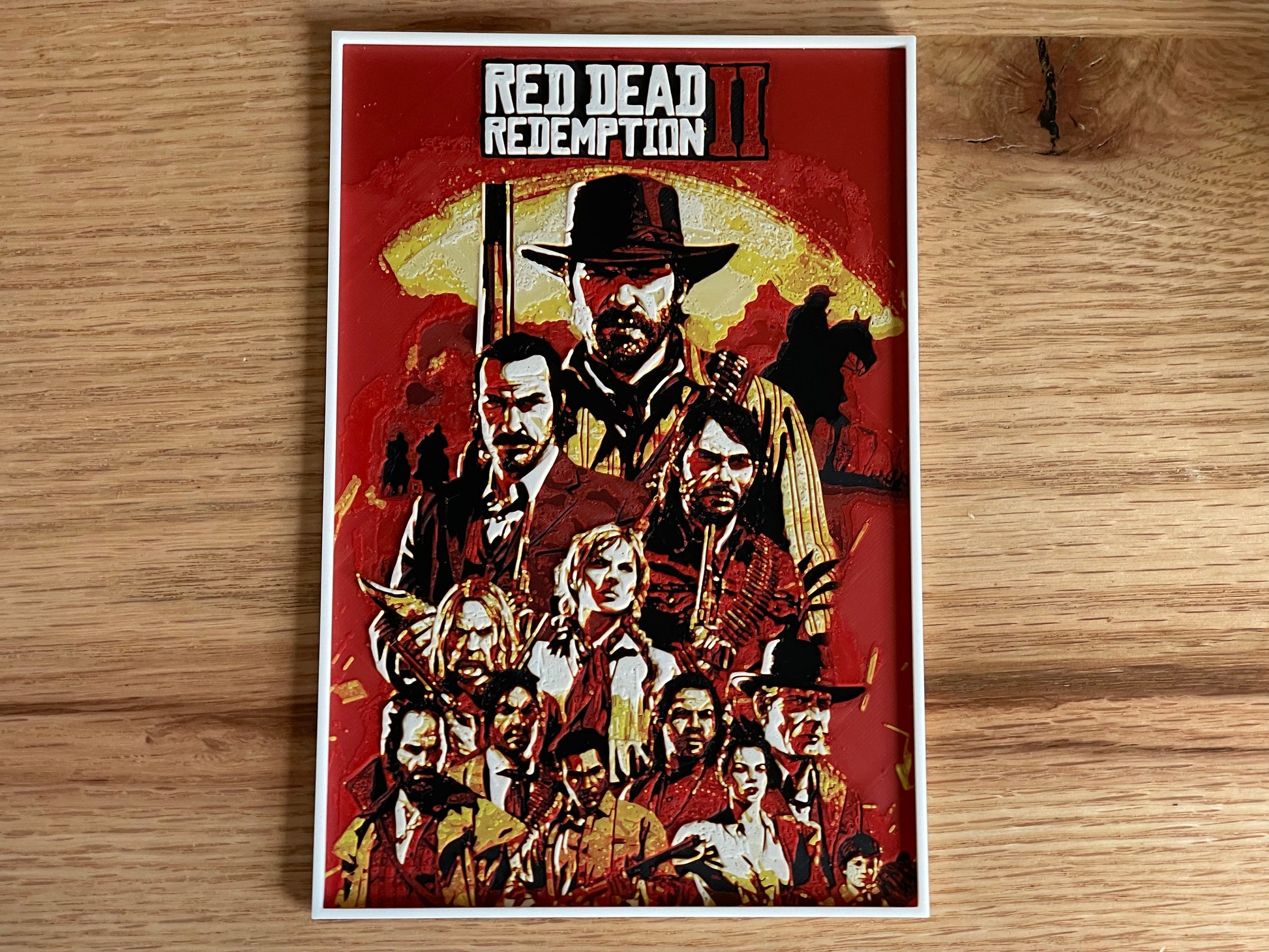 Poster of 'Red Dead Redemption II' game characters on a wooden surface