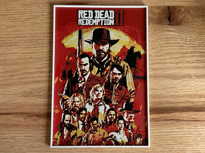 Poster of 'Red Dead Redemption II' game characters on a wooden surface
