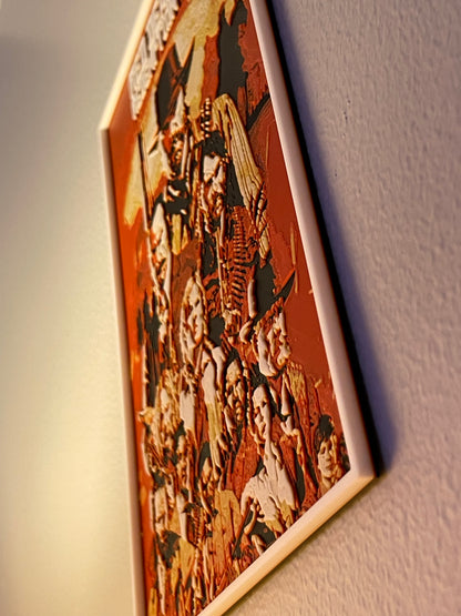 Decorative wall art with a geometric pattern on a plain wall.