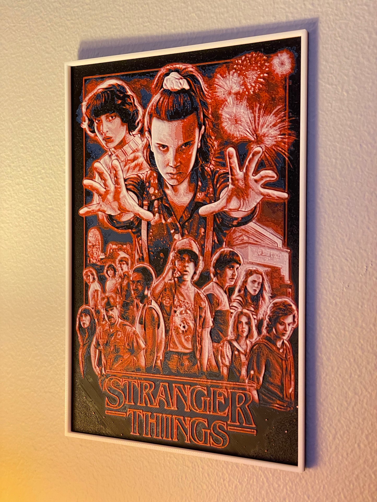 Framed 'Stranger Things' poster on a wall