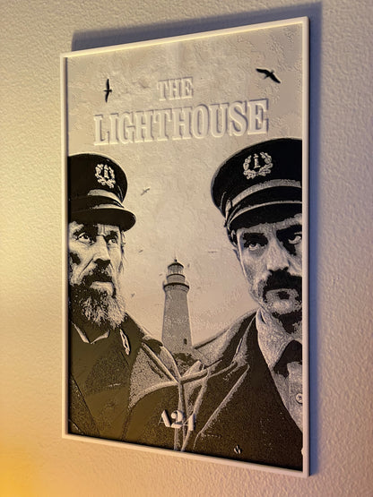 Poster of 'The Lighthouse' with two men in uniform and a lighthouse in the background.