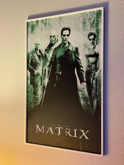 Framed 'The Matrix' movie poster on a wall