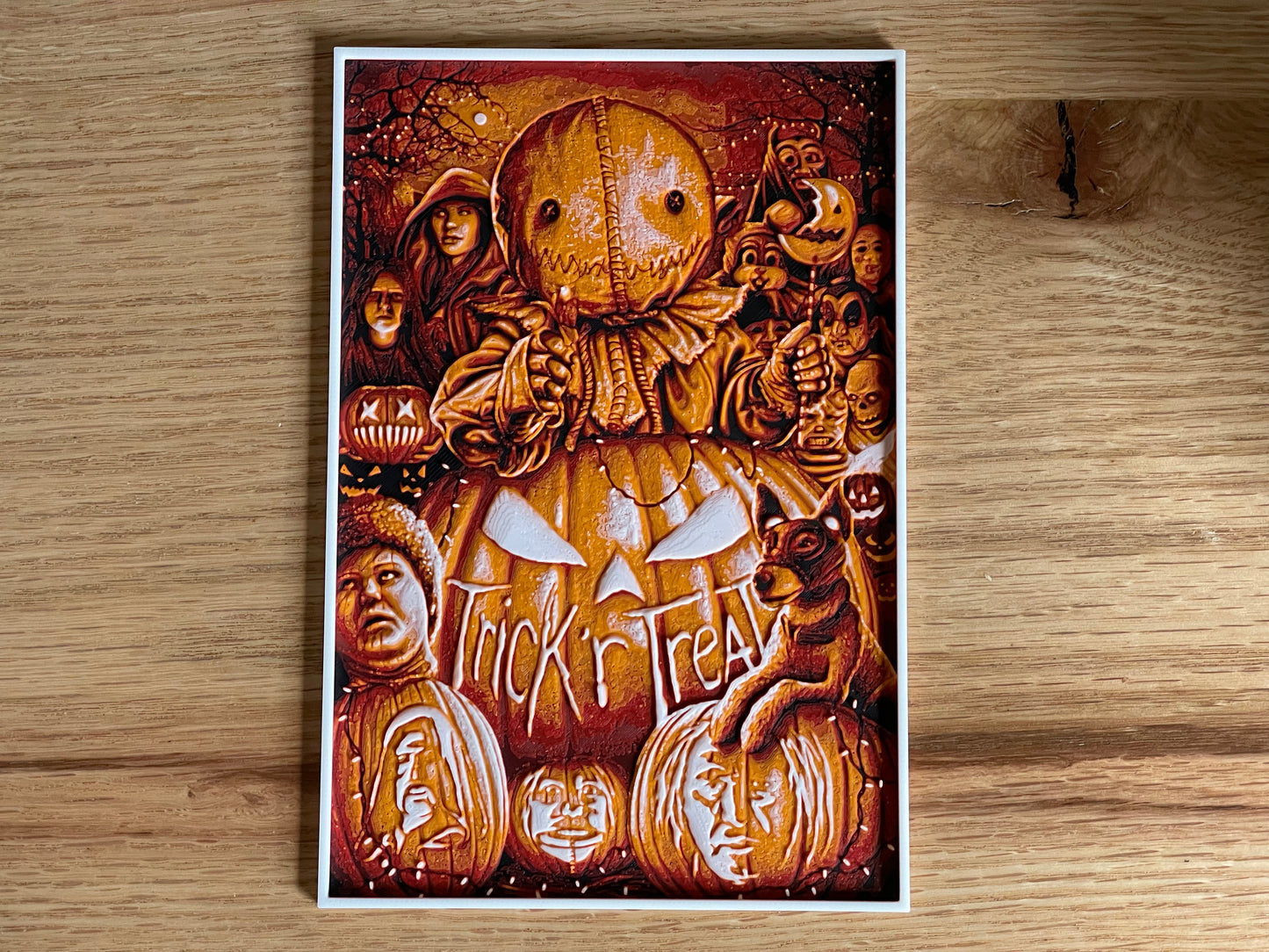 Halloween-themed poster with pumpkins and a dog on a wooden surface
