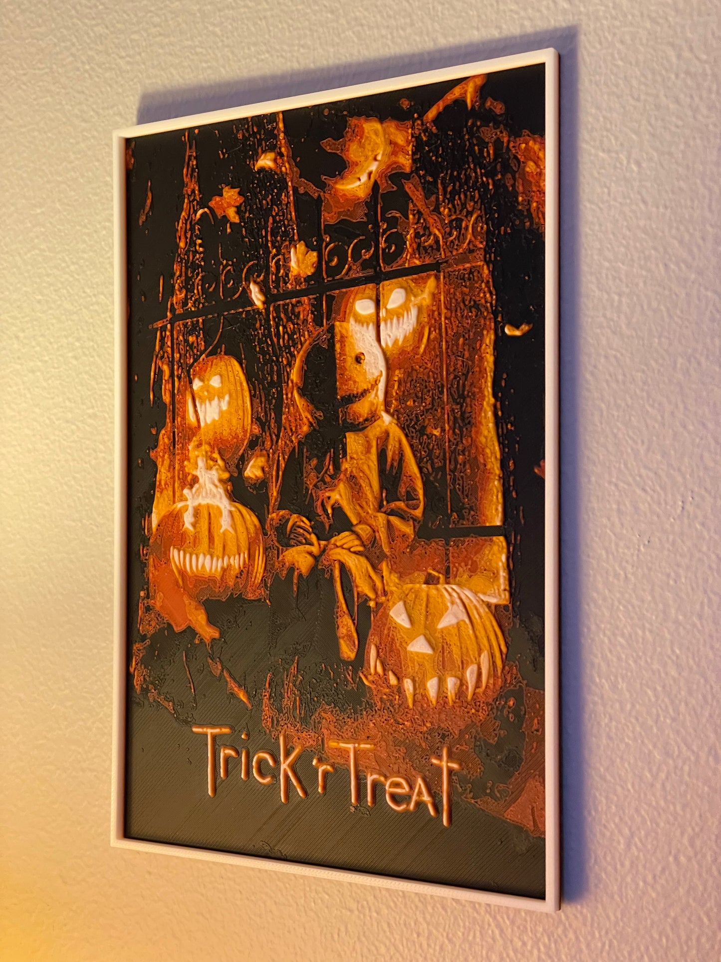 Halloween-themed poster with pumpkins and a ghostly figure, featuring the text 'Trick r Treat'.