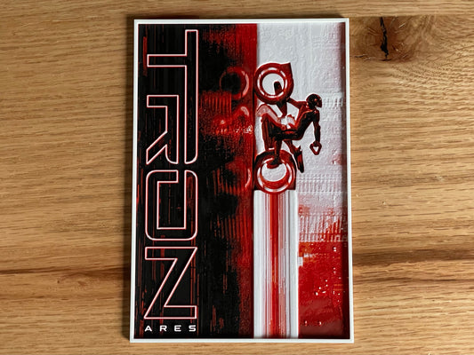 Tron movie poster on a wooden surface