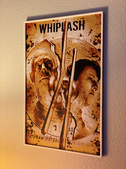 Decorative poster for 'Whiplash' with two faces and drumsticks on a musical note background.